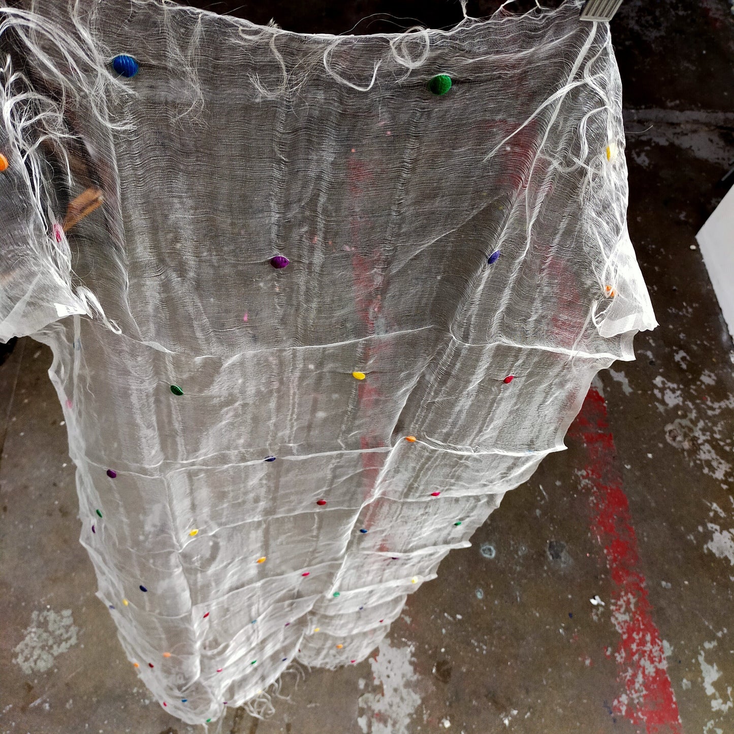 Sheer White Silk Scarf With Multi Coloured Bobbles Woven Through.