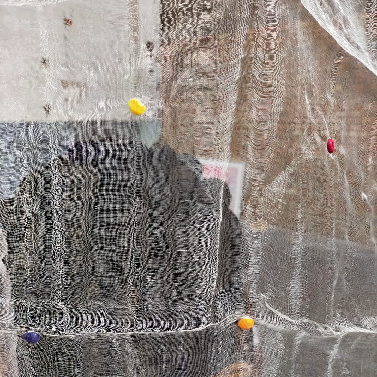 Sheer White Silk Scarf With Multi Coloured Bobbles Woven Through.
