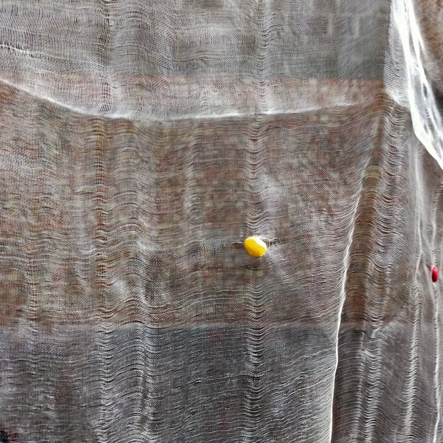 Sheer White Silk Scarf With Multi Coloured Bobbles Woven Through.