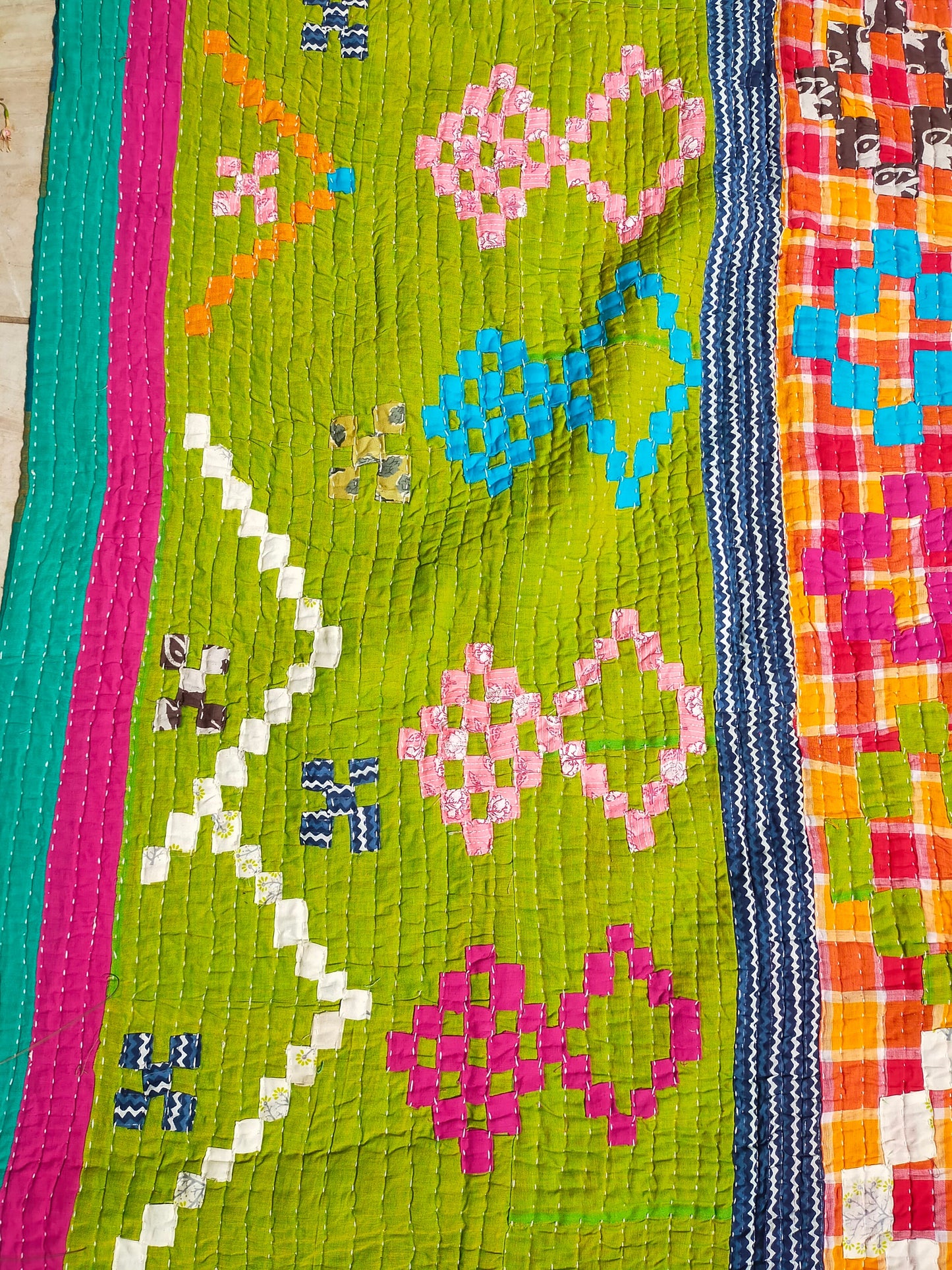 A Siddi Kawandi - A Patchwork Kantha Blanket Or Throw, Made With Upcycled Cotton - Hand-Stitched By African Indian Women In Karnataka