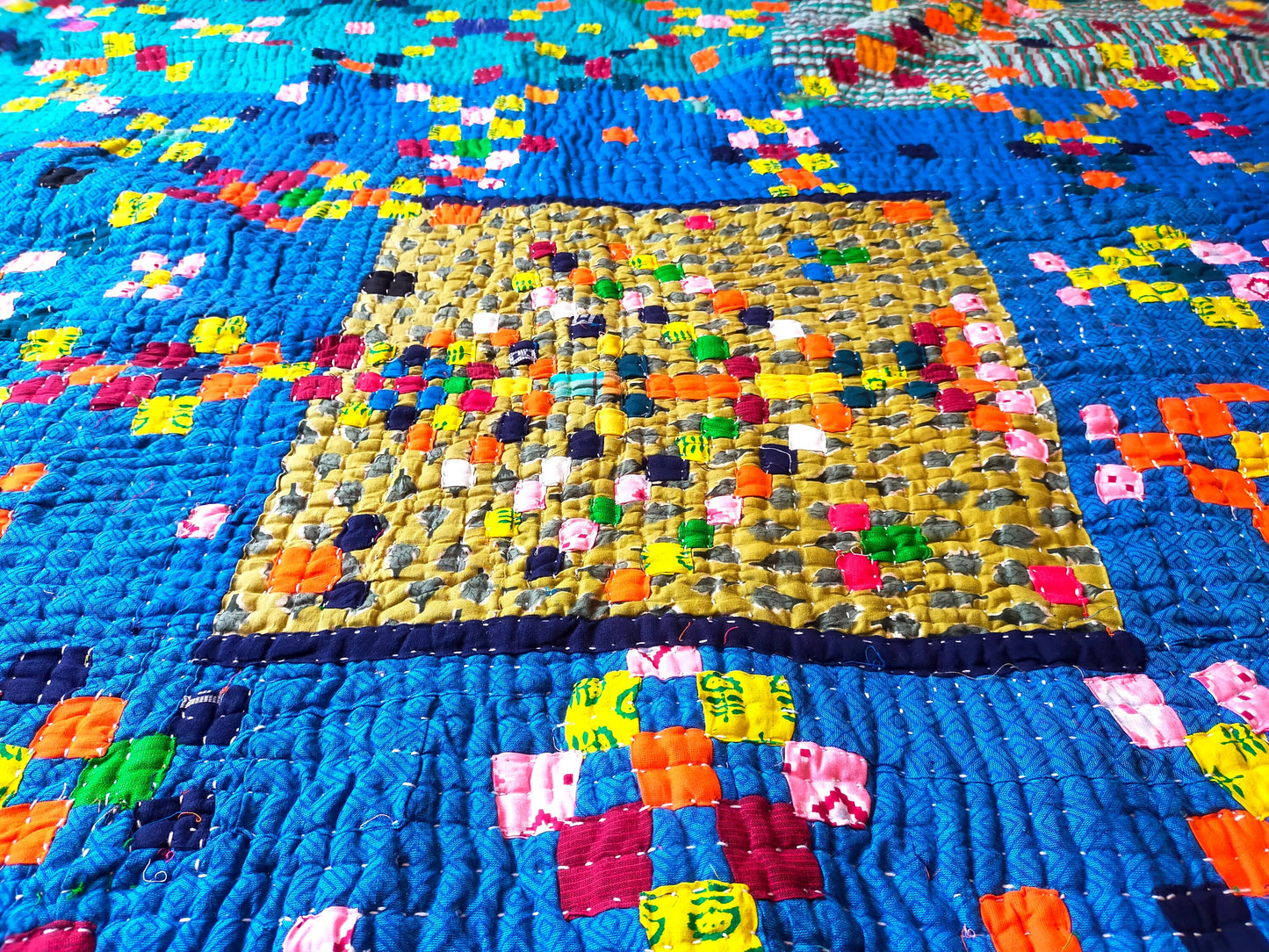 A Siddi Tribal Patchwork Kawandi Quilted Blanket Hand-Stitched In India