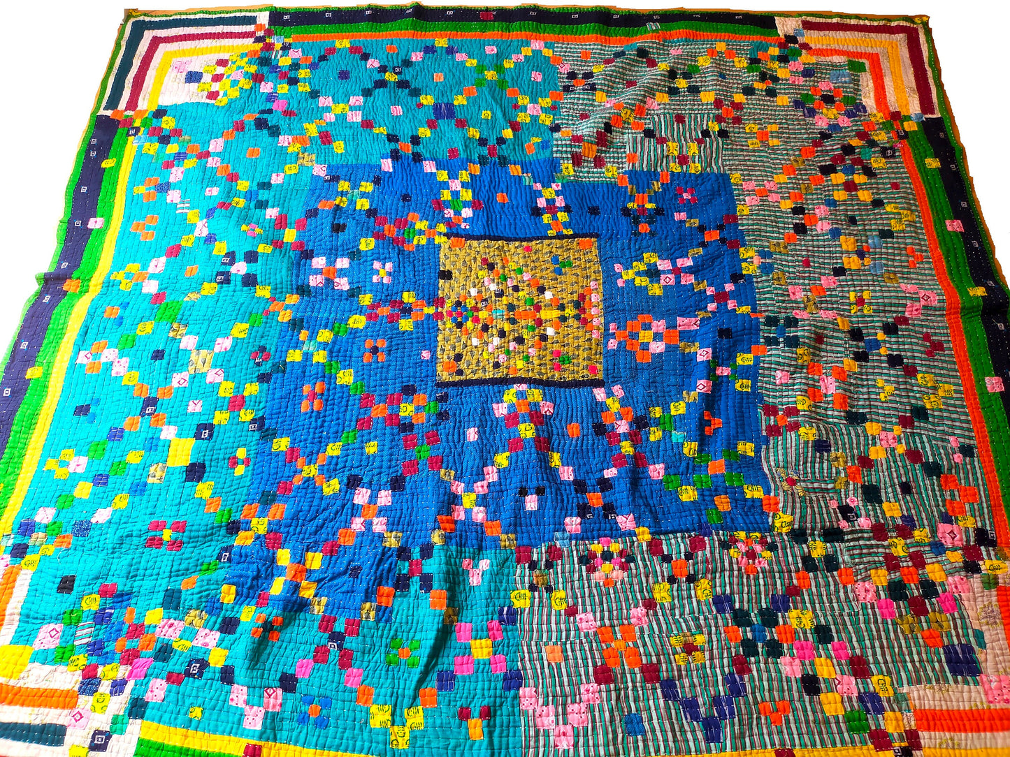 A Siddi Tribal Patchwork Kawandi Quilted Blanket Hand-Stitched In India